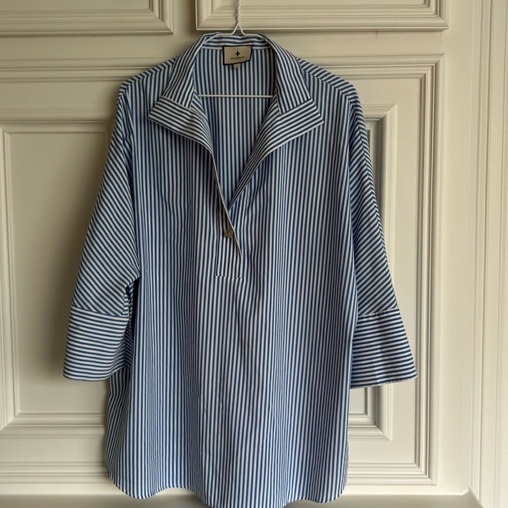 Tuckernuck blue and white striped top.30 inches long by 28 inches pit to pit